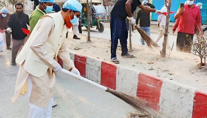 ঝাড়ু হাতে গাইবান্ধা শহর পরিষ্কারে এমপি আব্দুল করিম ঝাড়ু হাতে গাইবান্ধা শহর পরিষ্কারে এমপি আব্দুল করিম
