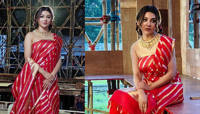 পূজায় লাল বেনারসিতে রাজকীয় সাজে জয়া পূজায় লাল বেনারসিতে রাজকীয় সাজে জয়া
