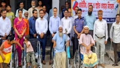 হাজীগঞ্জে দুর্যোগে ক্ষতিগ্রস্তদের ঢেউটিন, প্রতিবন্ধীদের হুইল চেয়ার ও চেক বিতরণ