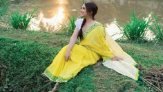 পুকুর পাড়ে হলুদ শাড়িতে ভাবনা