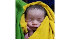 ঈশ্বরগঞ্জে ধানক্ষেতে পাওয়া নবজাতকের জন্য ১০ দম্পতির আবেদন