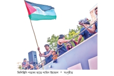 ইয়ামালের হাতে ফিলিস্তিনি পতাকা  