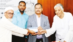 ঈদ উপলক্ষে আর্থিক সহায়তা প্রদান অনুষ্ঠানে চেক প্রদান করেন তথ্য ও সম্প্রচার মন্ত্রী  