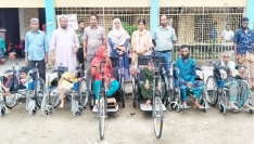 ঈশ্বরগঞ্জে প্রতিবন্ধীদের মাঝে হুইল চেয়ার ও ট্রাইসাইকেল বিতরণ