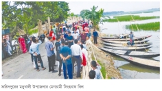 মধুখালীর সিংহনাথ বিলে দর্শনার্থীদের ভিড়  