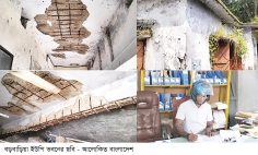 মাথার ওপর ঝুঁকিপূর্ণ ছাদ হেলমেট পরে অফিস 