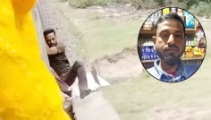 চলন্ত ট্রেন থেকে ঝুলিয়ে রেখে ধাক্কা, ভিডিও ভাইরাল